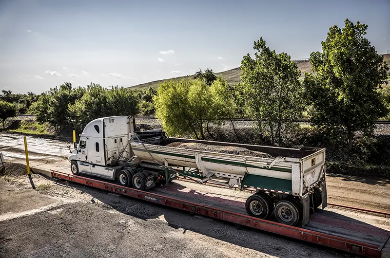 Large Semi Truck Hauling Old Concrete on a Weigh Scale